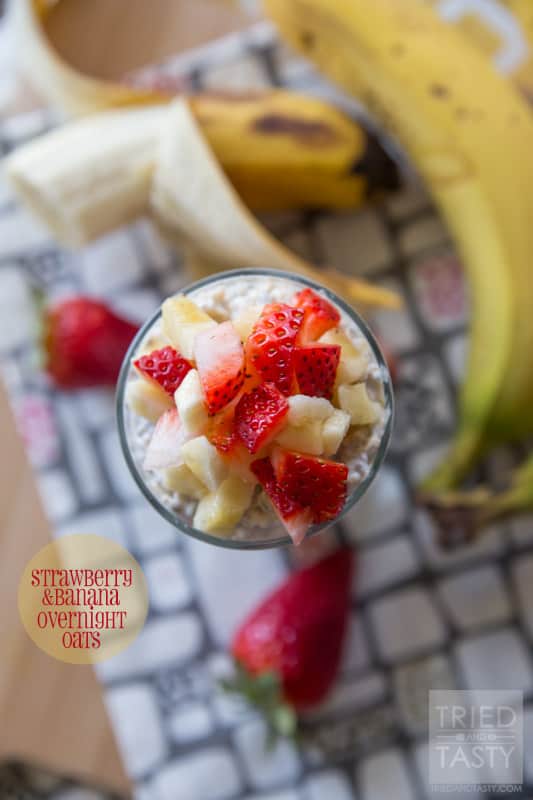 Strawberry & Banana Overnight Oats in a glass with fresh fruit.
