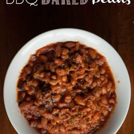 Homemade BBQ baked beans loaded with flavor and, most importantly, bacon cannot be beat for any summer outdoor barbecue with friends or family.