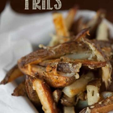  a pile of homemade rosemary garlic baked fries