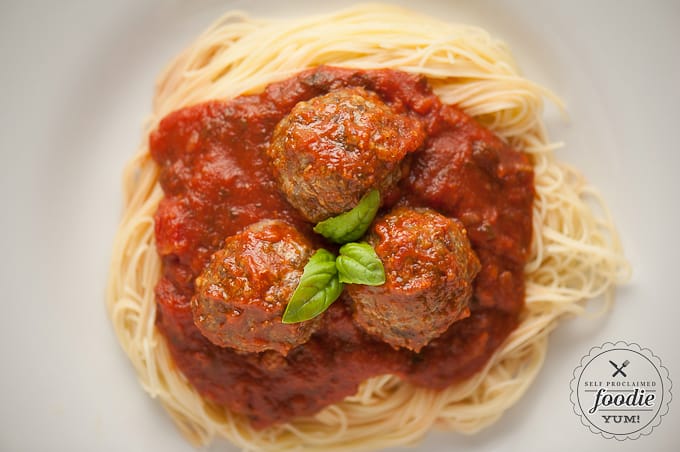 homemade baked italian Basil Meatballs with spaghetti