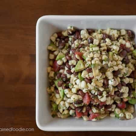 Black Bean and Corn Salad is the perfect healthy side dish. Its loaded with black beans, roasted corn, avocado, fresh tomato, cilantro, and tons of flavor.