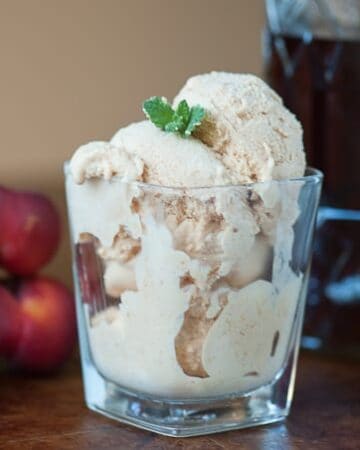 This homemade Bourbon Nectarine Ice Cream is the perfect blend between sweet fresh fruit and creamy vanilla bean ice cream with a smooth bourbon finish.