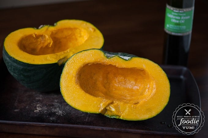 whole winter squash cut in half and covered in olive oil