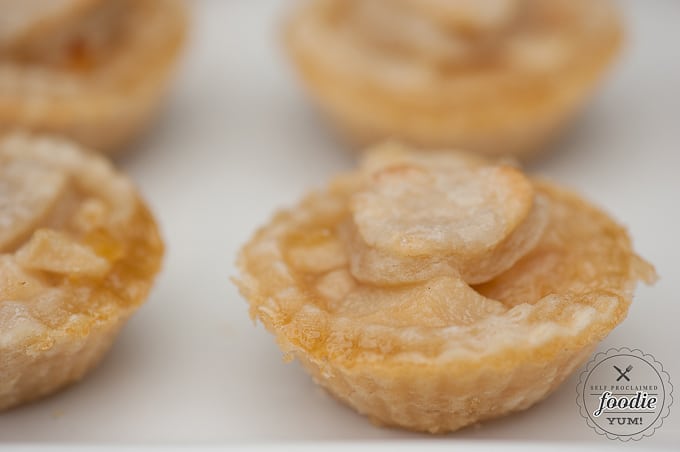 A close up of a mini pear tart