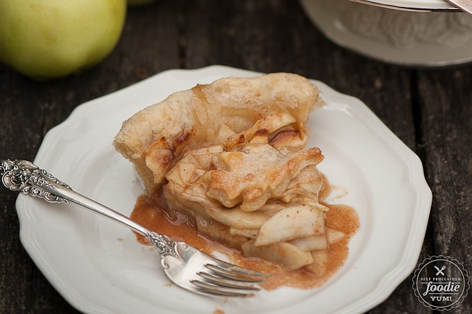 A slice of hard cider caramel apple pie