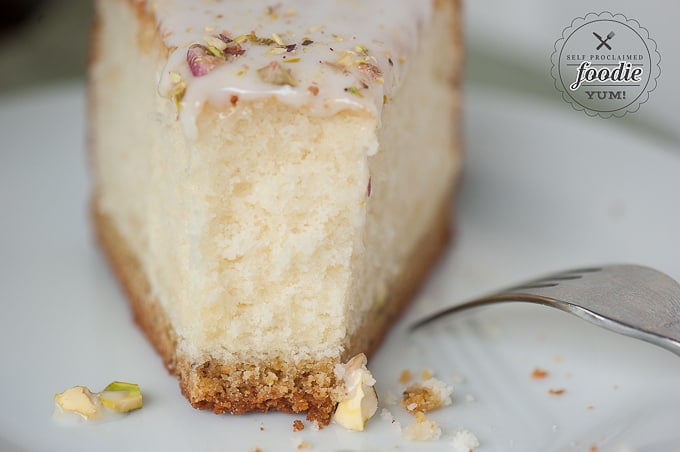 A half eaten piece of cake on a plate