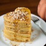 These Pumpkin Hazelnut Pancakes are made with pumpkin puree, toasted hazelnuts, and all the right spices for a delicious fall morning breakfast.