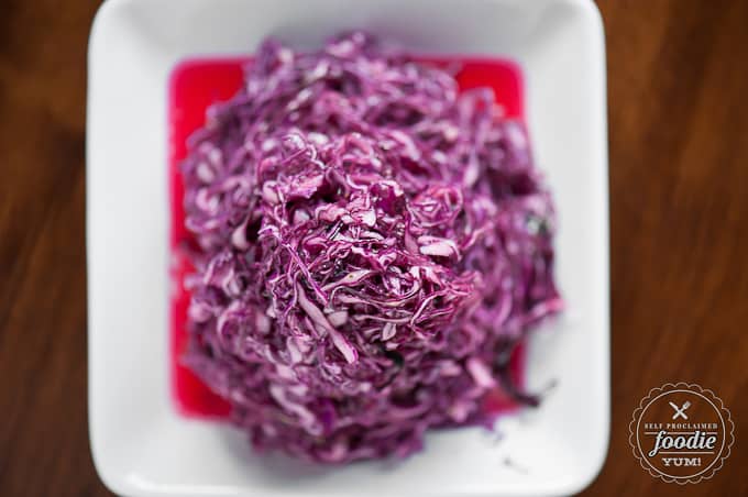 top of purple cabbage slaw with lemon vinaigrette