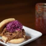 This is the best Slow Cooker Pulled Pork recipe you'll find. Its moist, flavorful and makes a perfect family dinner or game day treat.
