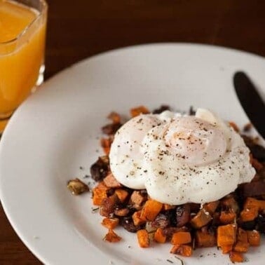 Imagine waking up on a chilly Fall morning to enjoy Poached Eggs over Sweet Potato Hash for breakfast. YUM!
