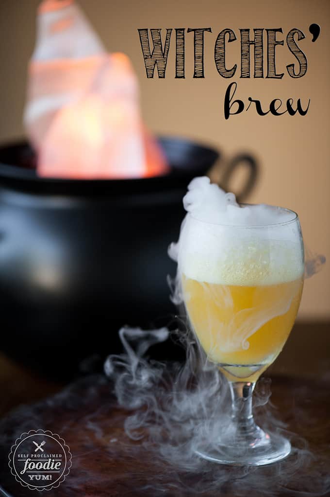 a glass of kid friendly Halloween punch with dry ice