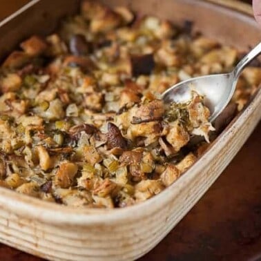 Thanksgiving wouldn't be complete without my favorite side dish: moist and flavorful Wild Mushroom Stuffing made with rosemary bread.