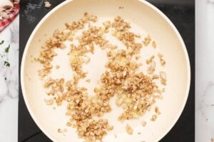 sauteed garlic with diced mushrooms stems.