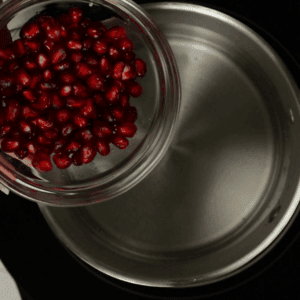 making pomegranate simple syrup.