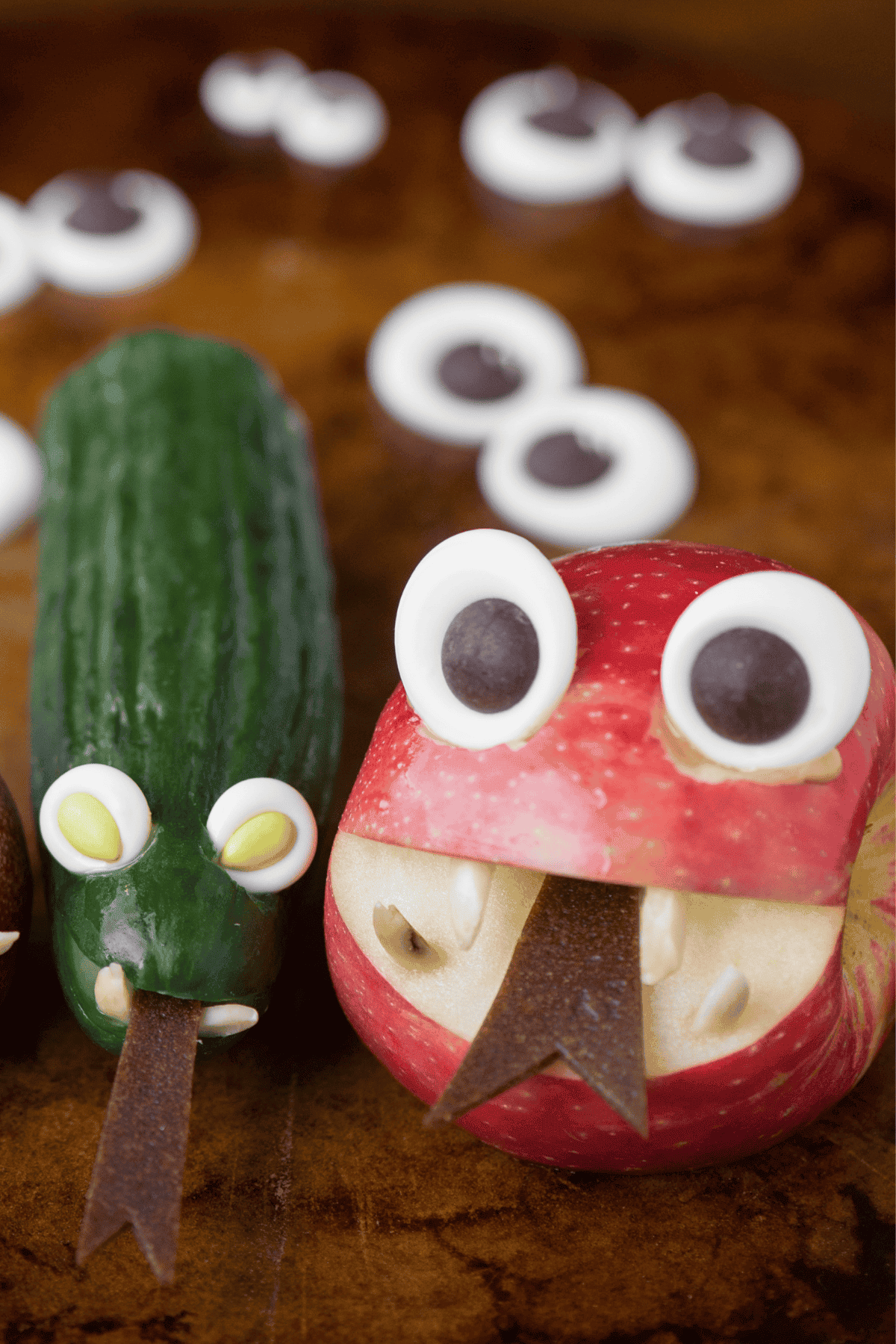 homemade candy eyes with an apple and cucumber.