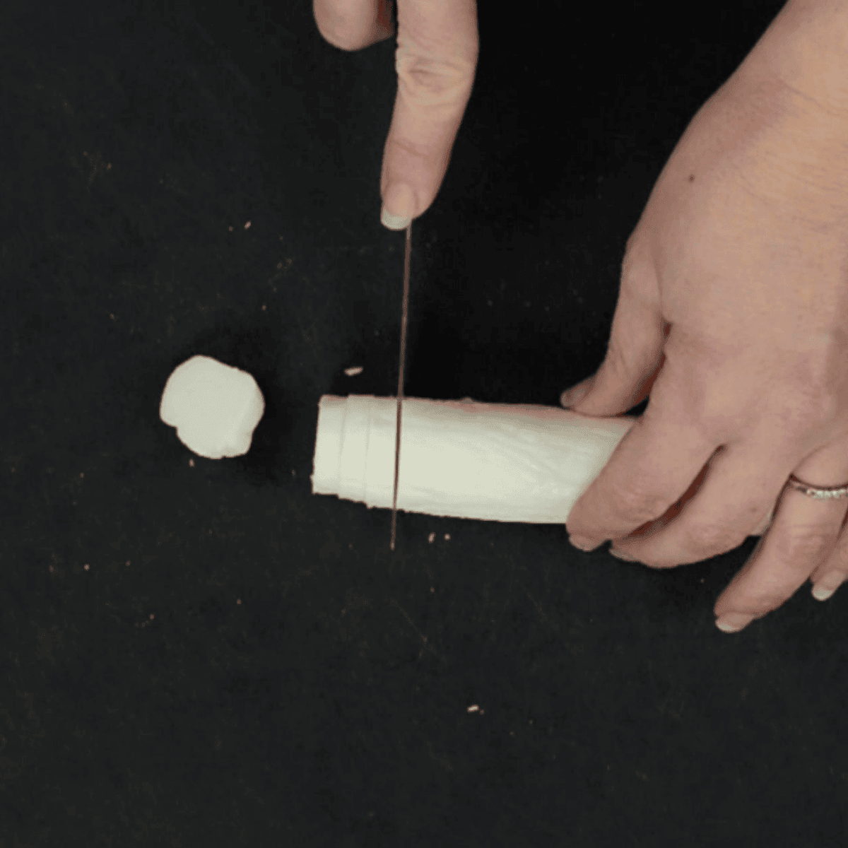 slicing homemade peppermint patties.