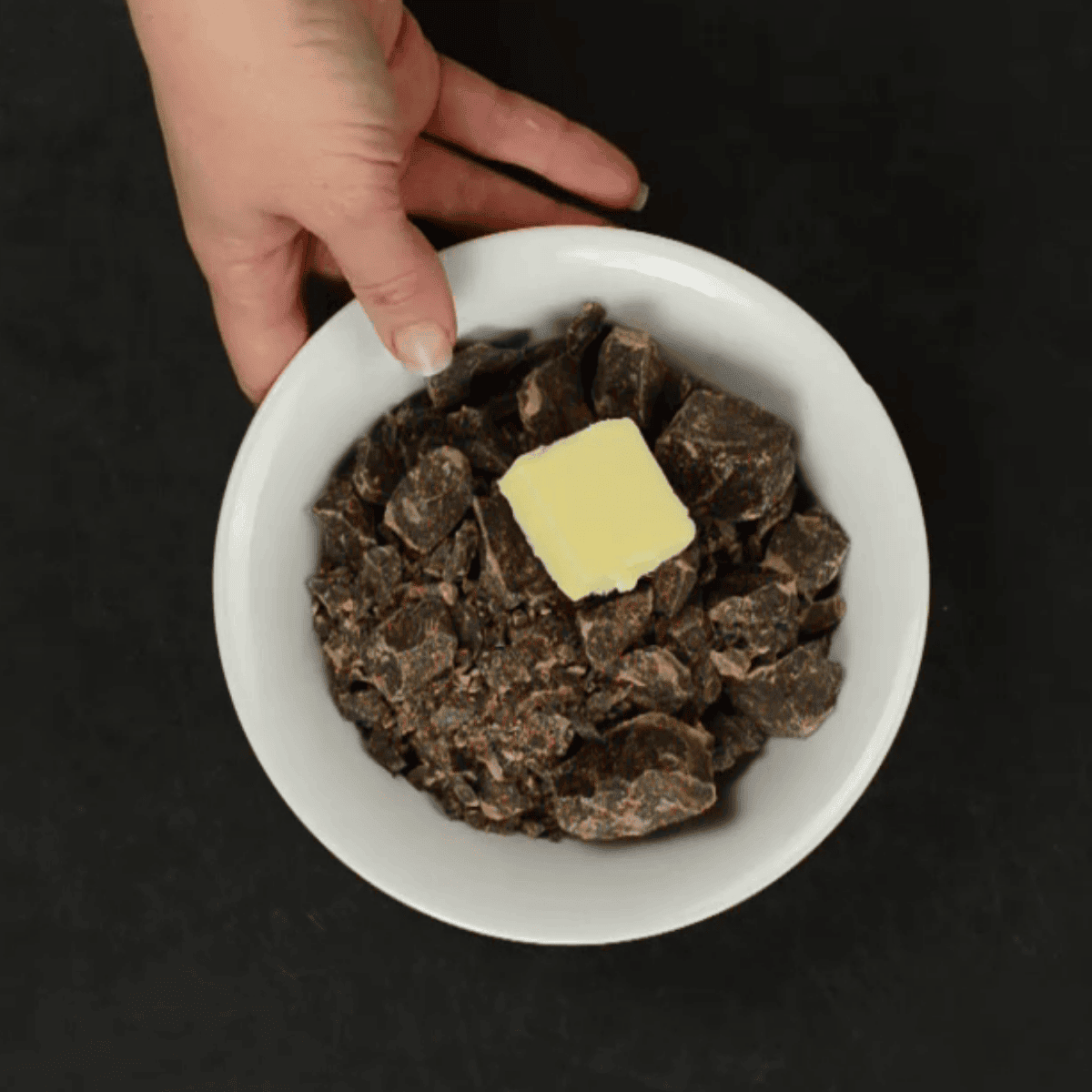 melting butter into chocolate.