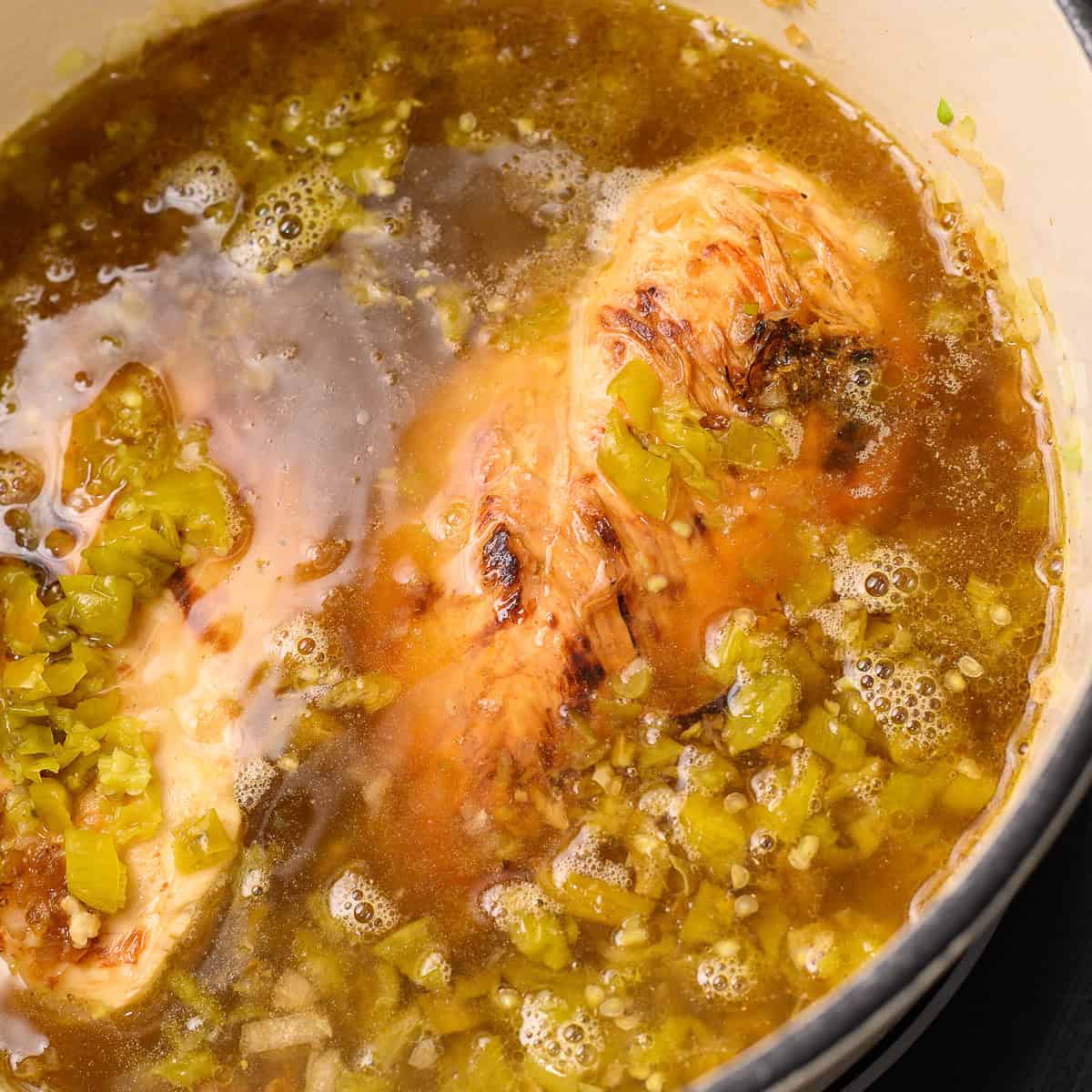 making green chile chicken stew.