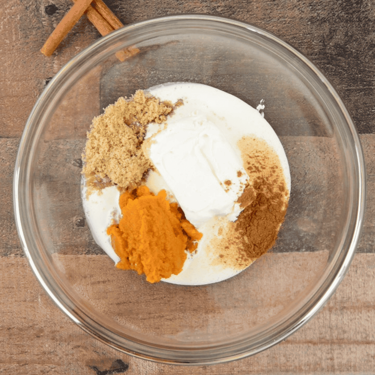 making cream cheese pumpkin fruit dip.