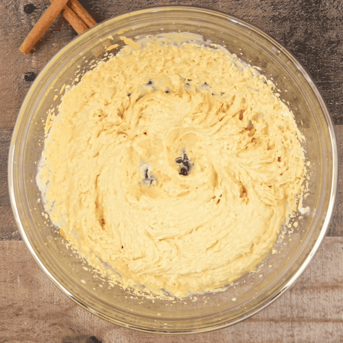 making cream cheese pumpkin fruit dip.