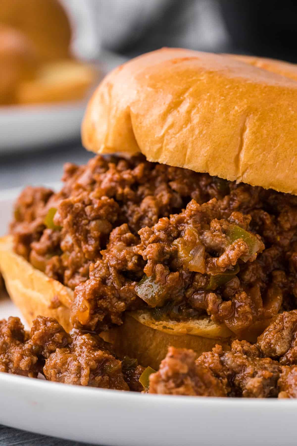 Homemade sloppy joes served on a bun with tater tots.