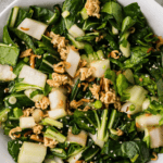 Recipe for homemade bok choy salad with a crunchy ramen almond topping.