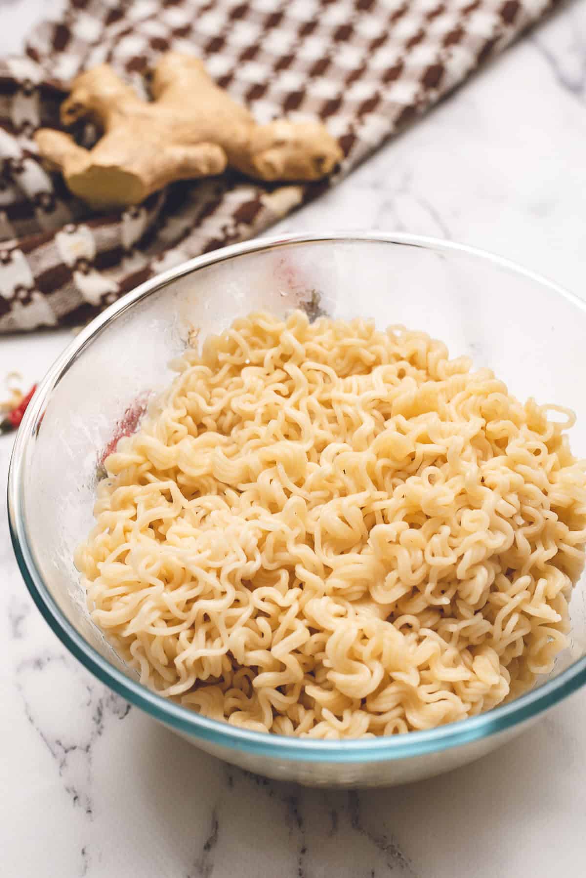 cooked instant ramen noodles in bowl.