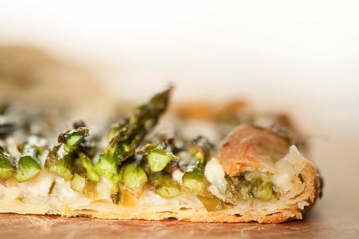 close up of puff pastry asparagus galette.