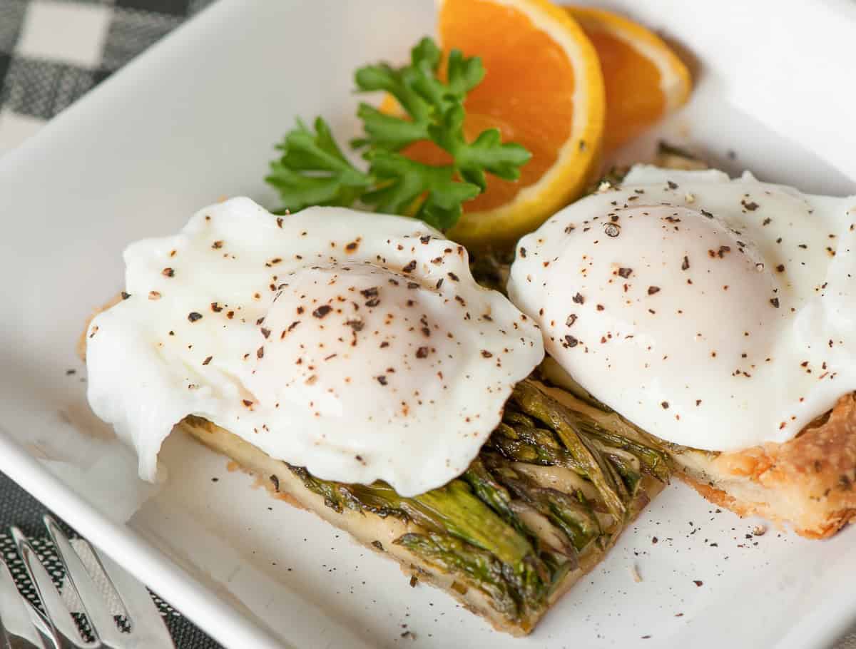 puff pastry asparagus galette with poached eggs.