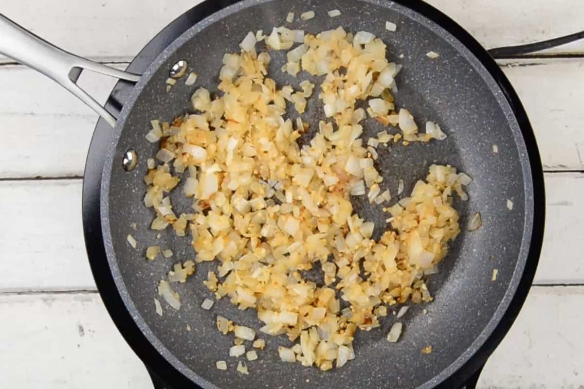 sauteed onions in pan.