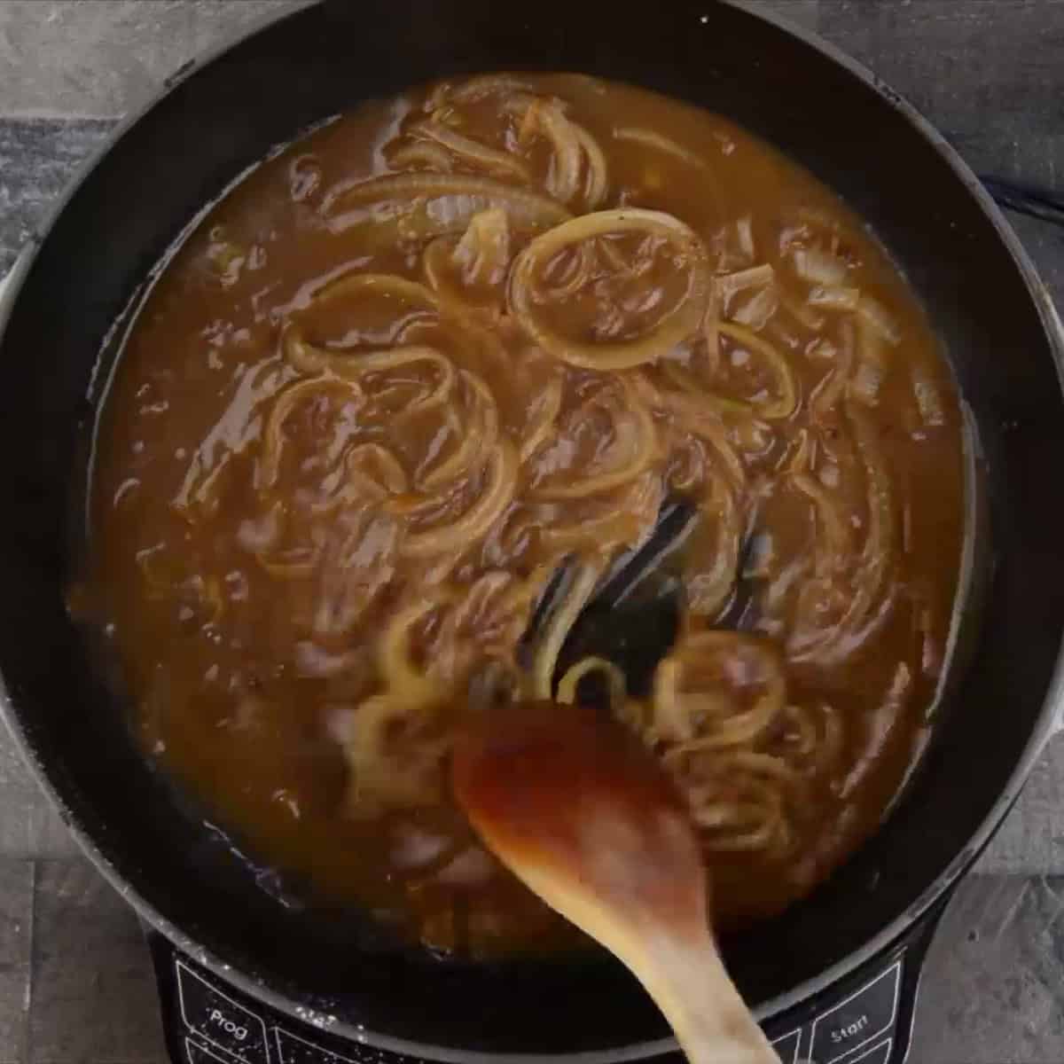 Making Irish stout onion gravy.