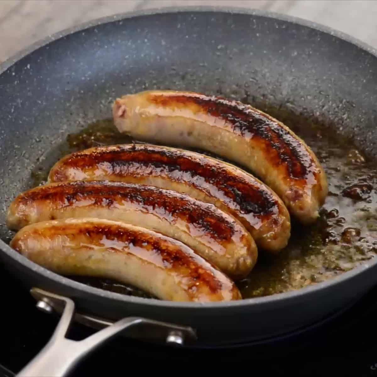 cooking sausages in Guinness stout beer.