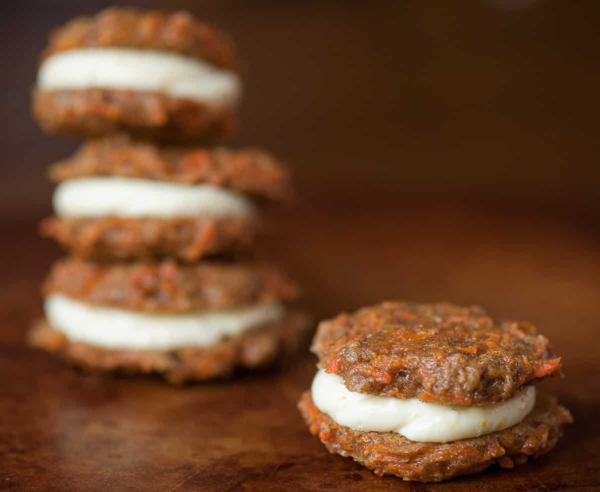 carrot cake sandwich cookies with cream cheese frosting.