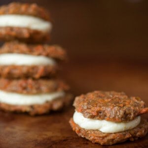 carrot cake sandwich cookies with cream cheese frosting.