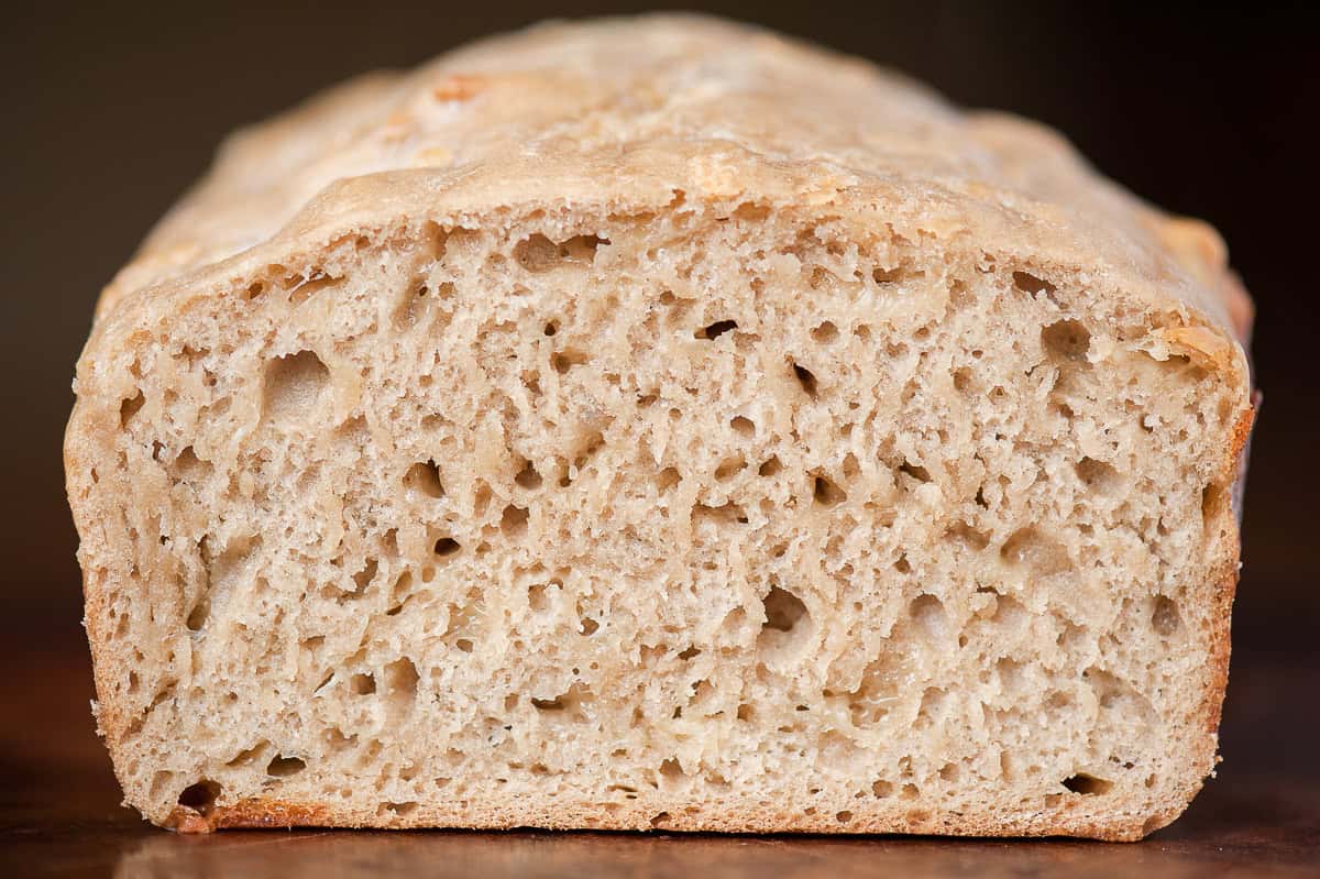 Showing the inside of a loaf of Guinness beer bread.