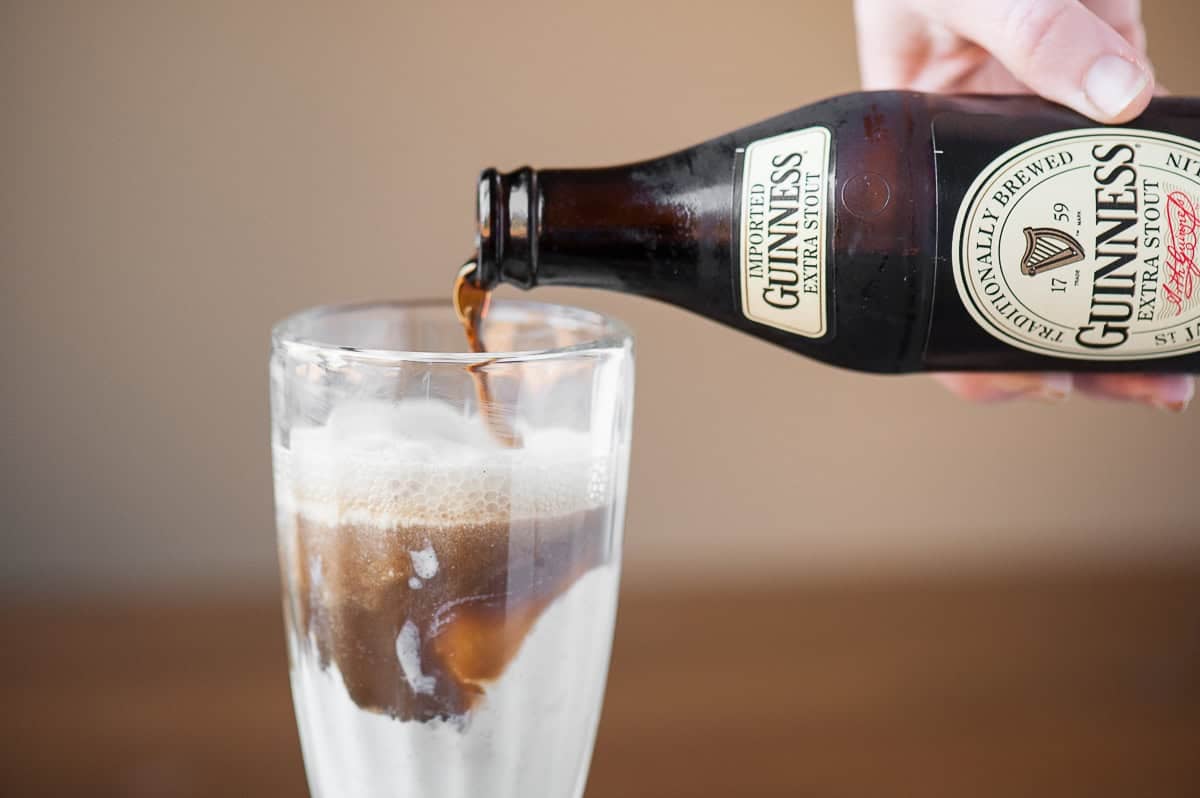 pouring guinness stout beer over ice cream.