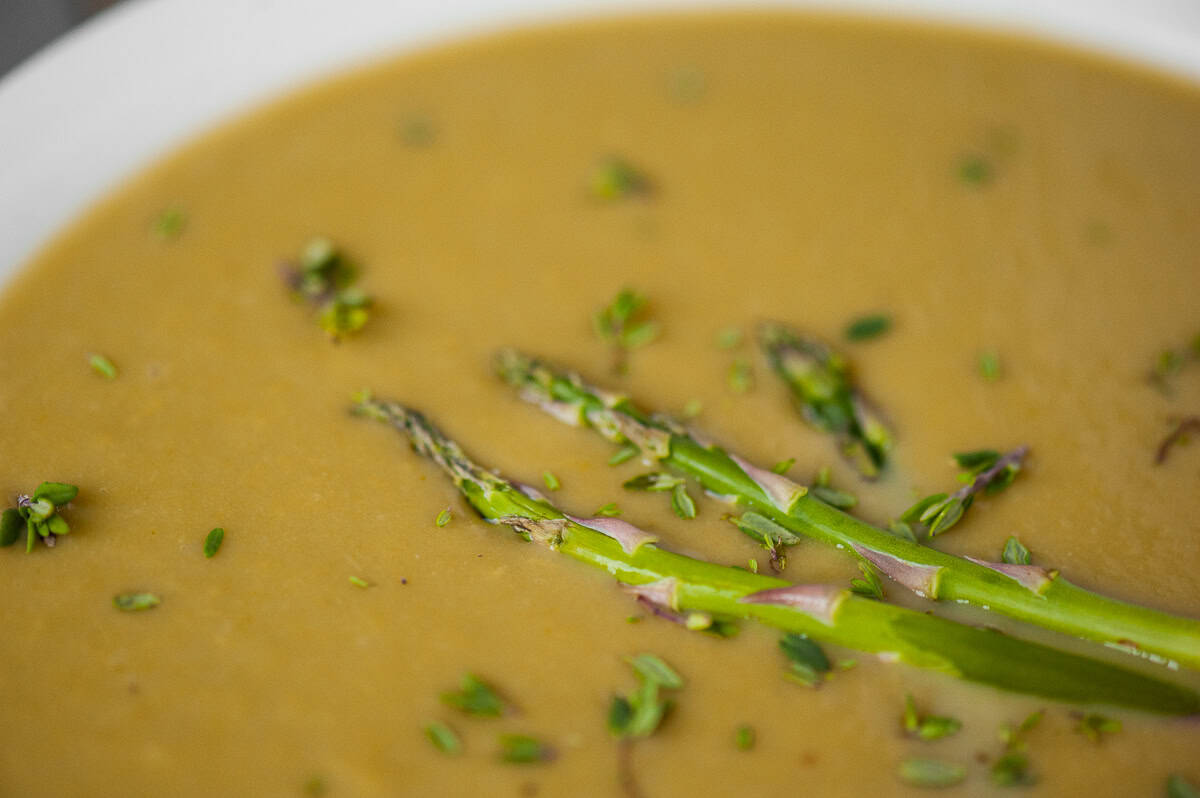 Bowl of creamy asparagus soup.