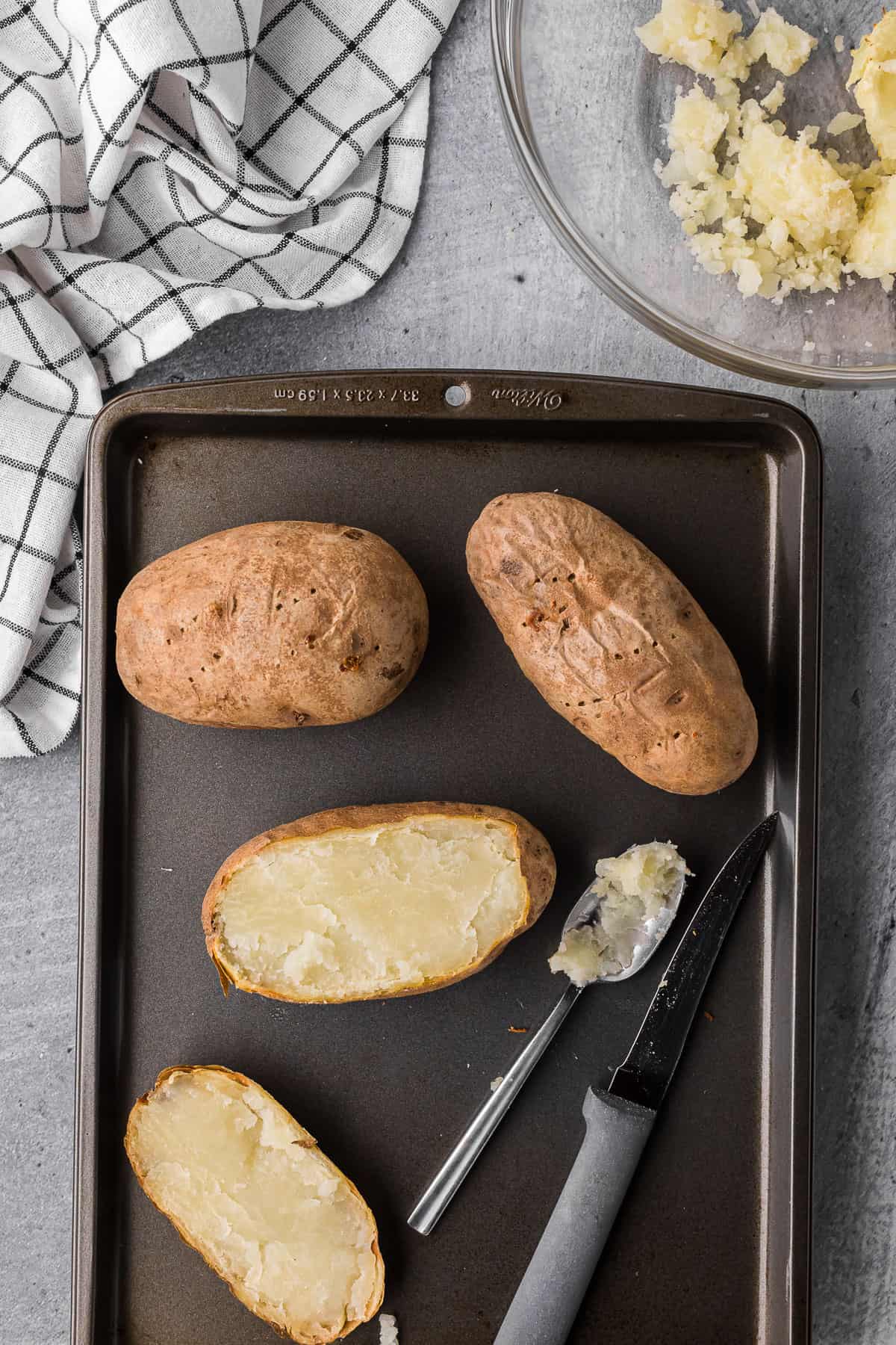 baked potatoes cut in half.