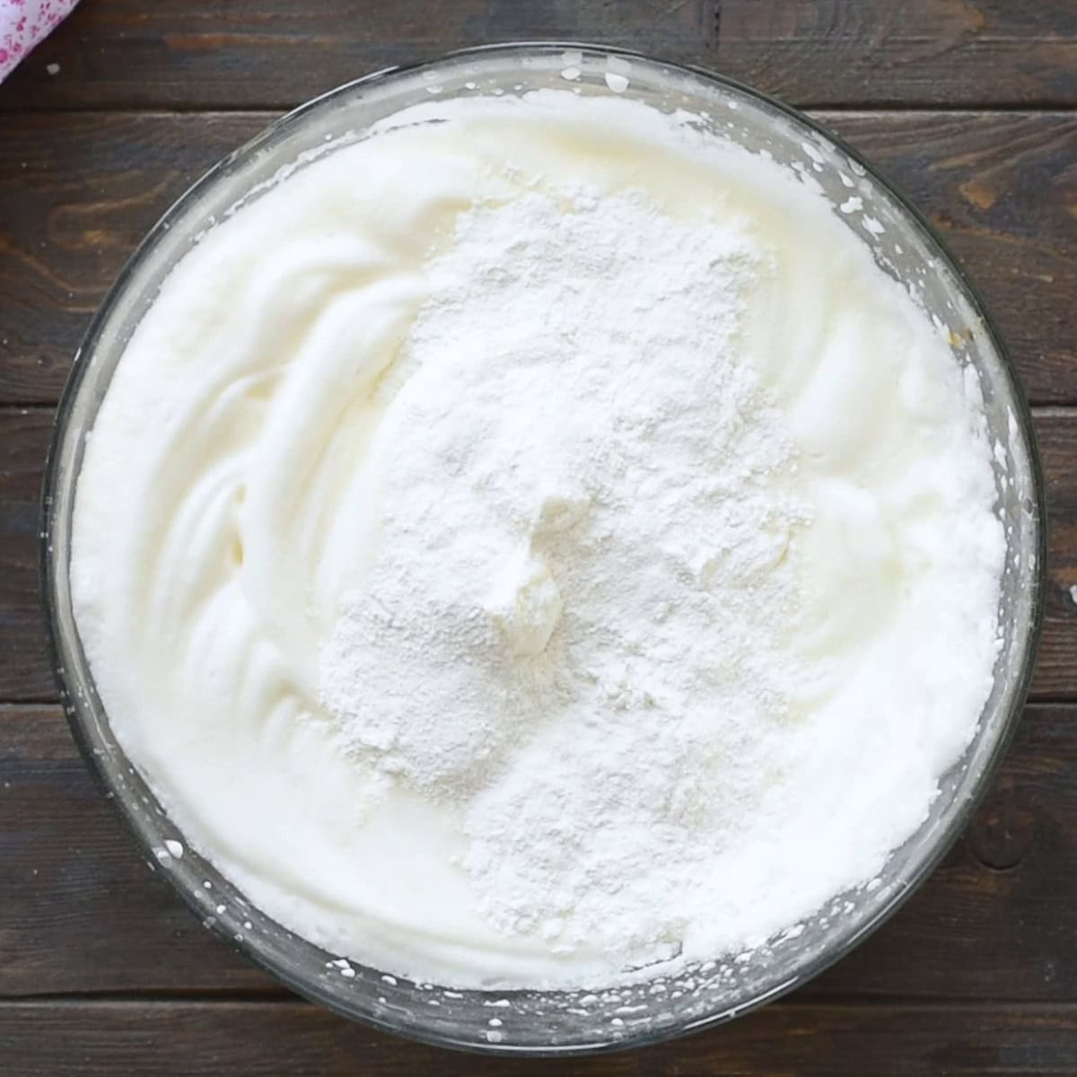 Mixing egg whites with flour.