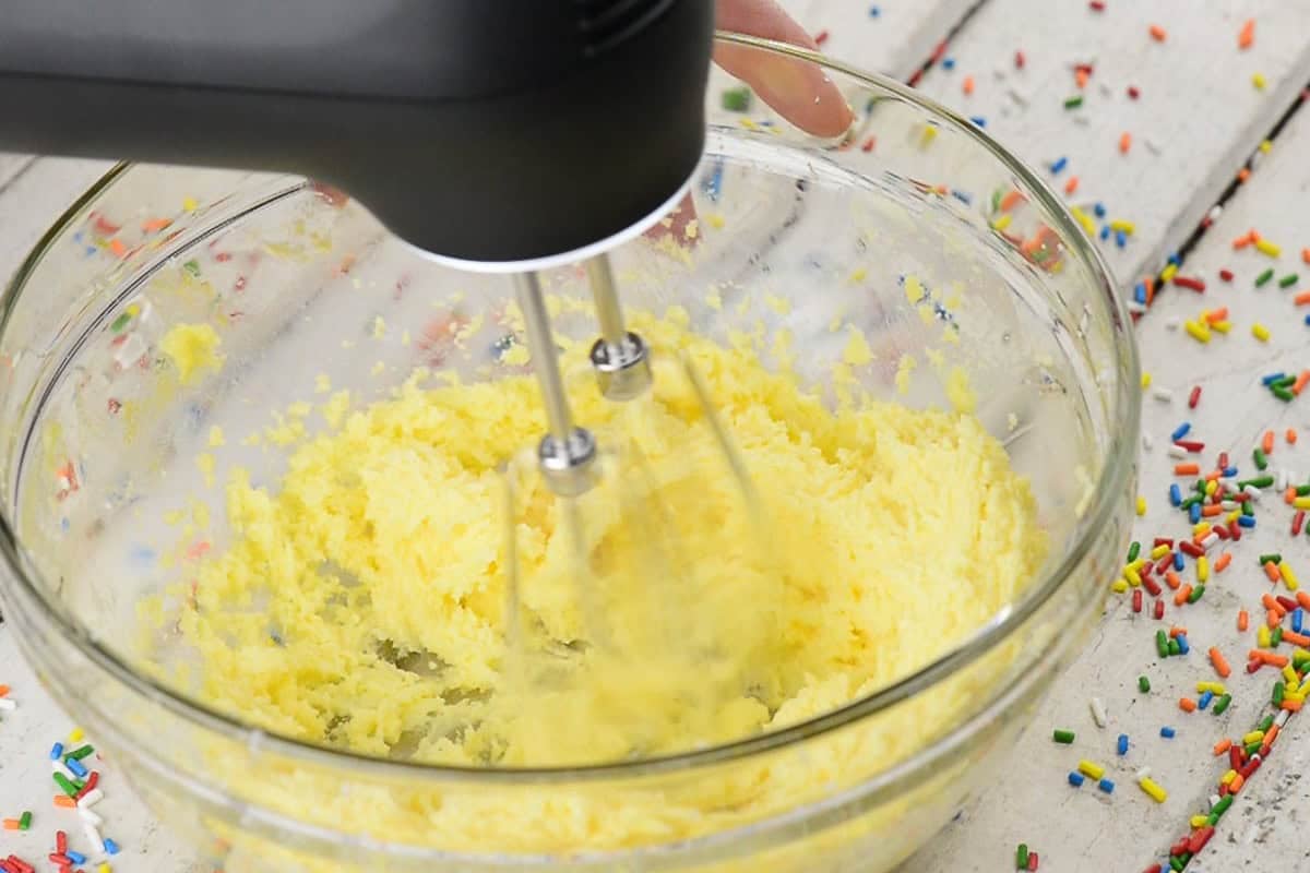 creaming butter and sugar with electric mixer.