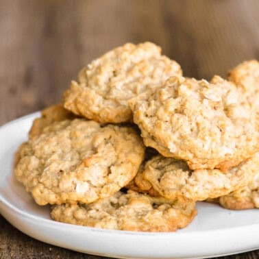 stack of chewy oatmeal cookies on a plate.