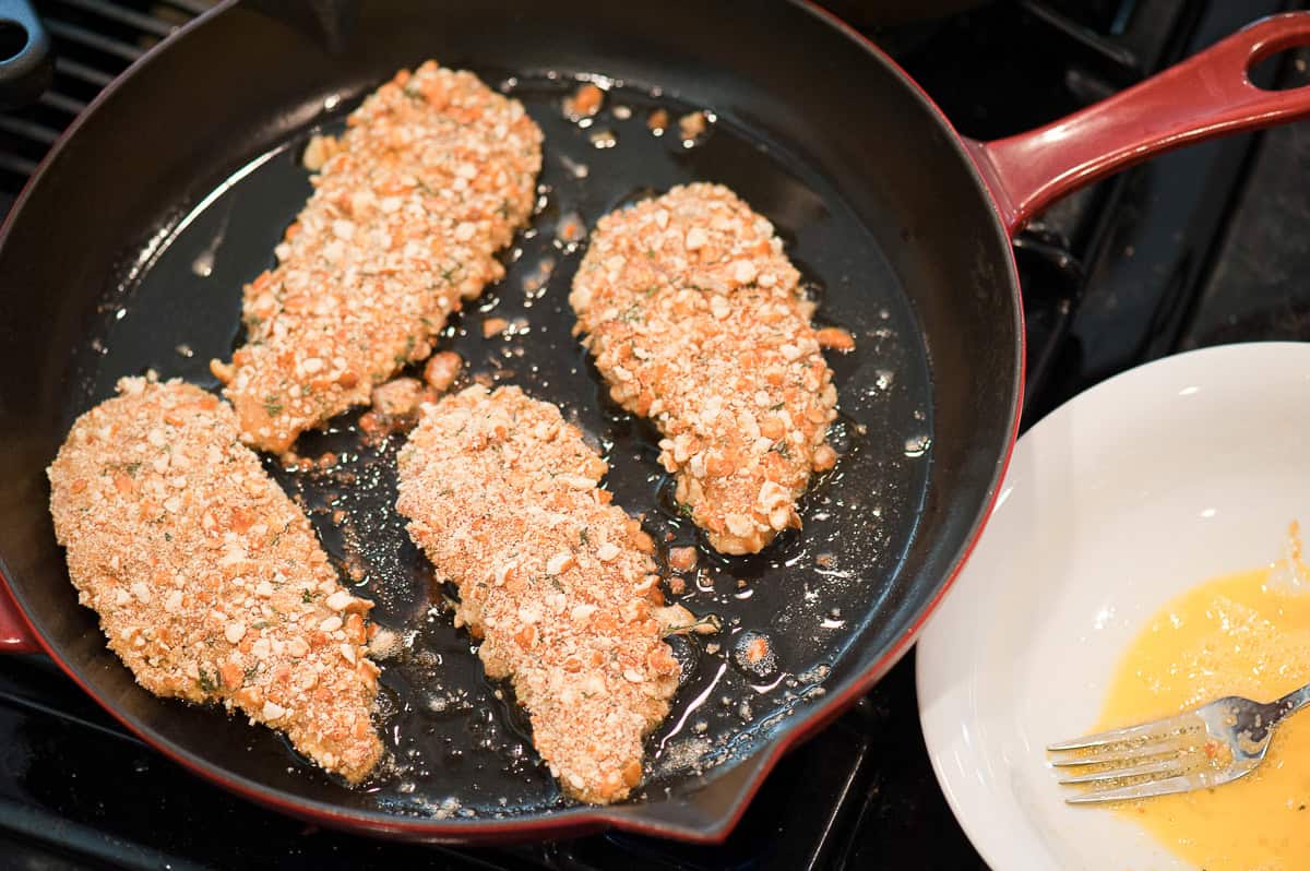 frying pretzel coated chicken tenders.