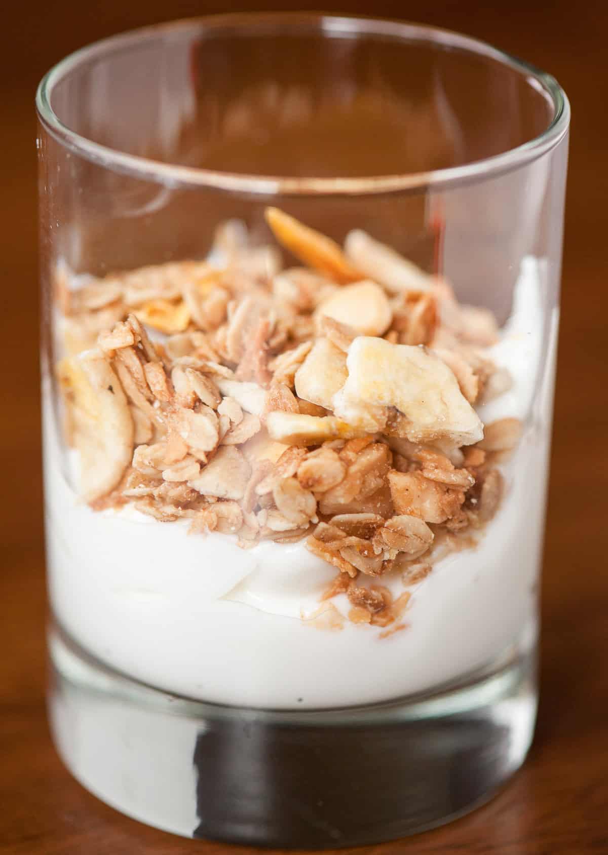 Homemade tropical granola over coconut yogurt.