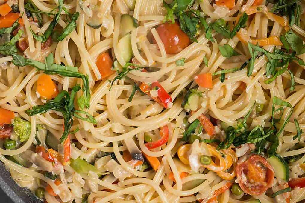 a close up of dozen veggie pasta primavera