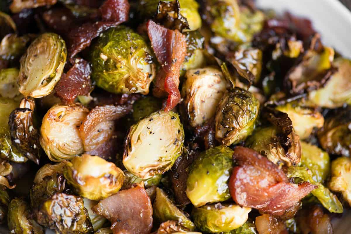 Close-up of crispy browned Brussels sprouts and bacon pieces