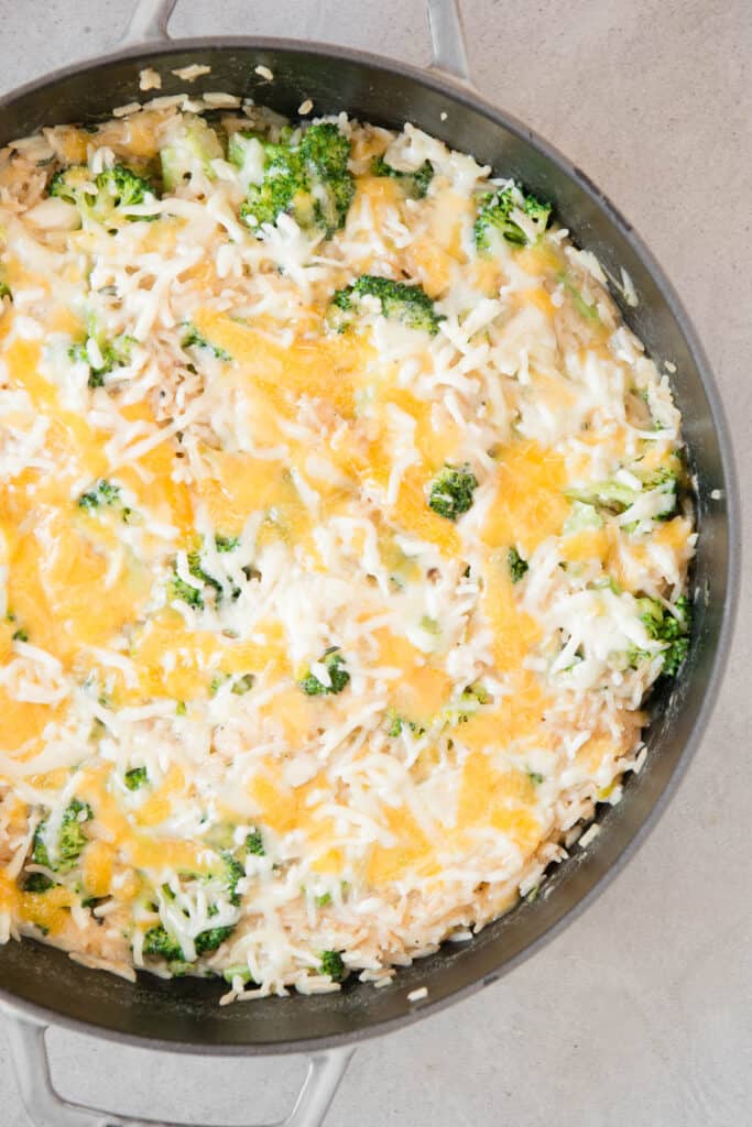 broccoli and rice casserole with cheese on top