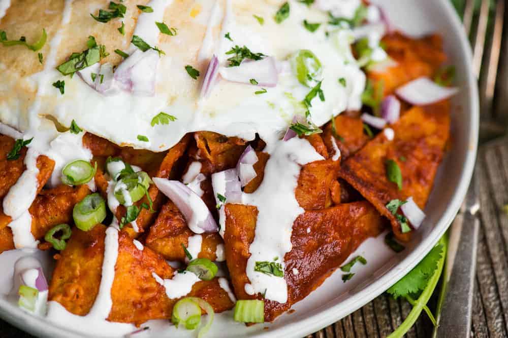 recipe for authentic Chilaquiles with red enchilada sauce and eggs