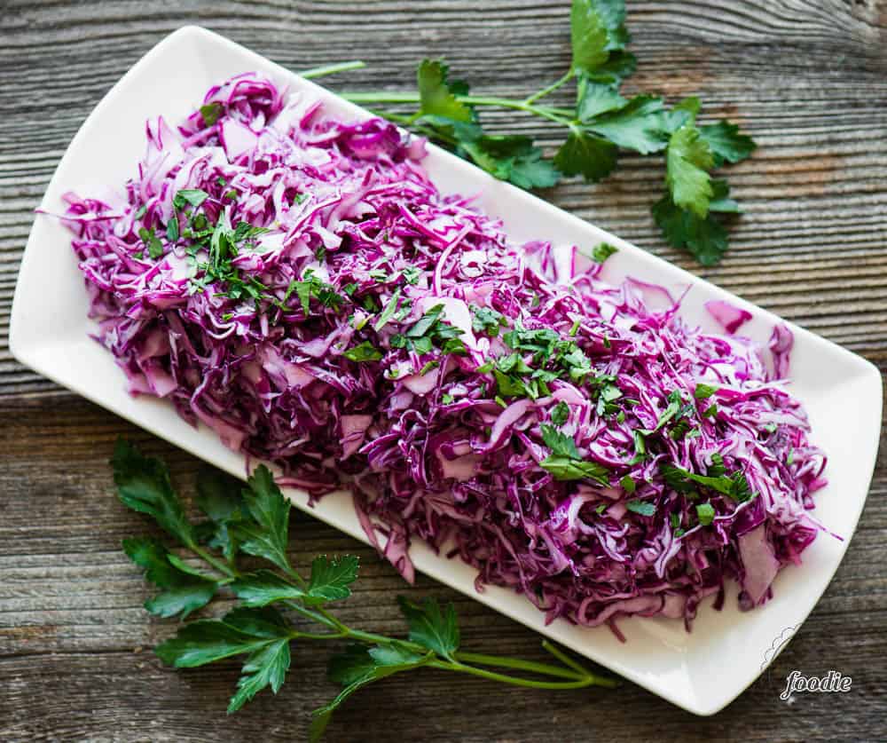 Red cabbage Creamy Vegan Coleslaw on platter