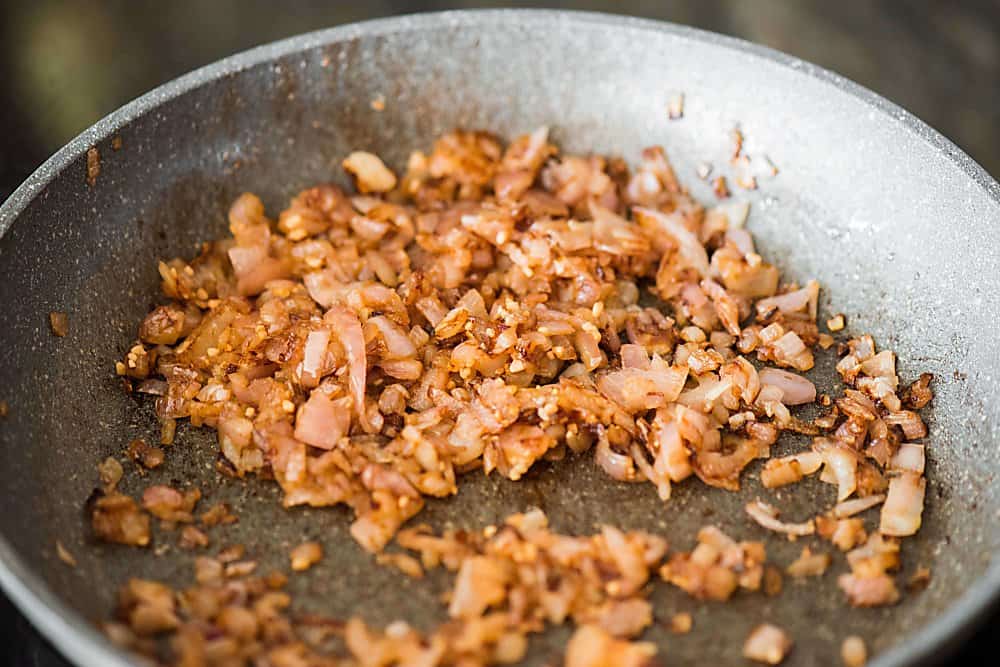 A close up of a metal pan filled with food