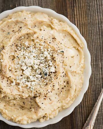 Gorgonzola Celery Root Mashed Potatoes are the creamiest, most flavorful side dish recipe I've ever enjoyed! Perfect for Thanksgiving or a weekday dinner!